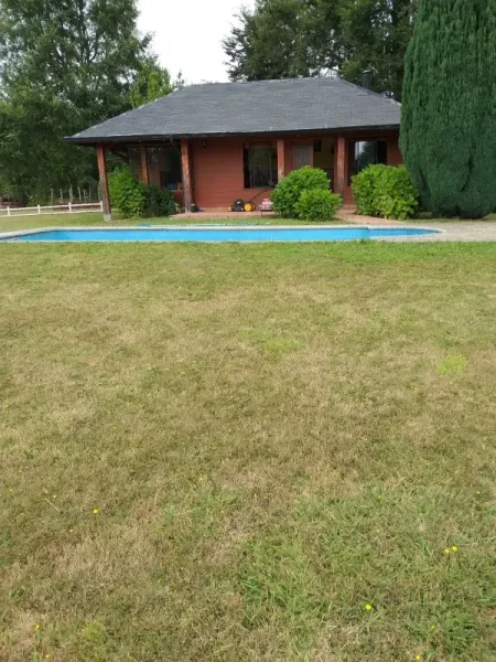 Parcela de 5.000 m² en condominio Puerto Pucón, Villarrica, con cabaña y piscina — foto 5/8